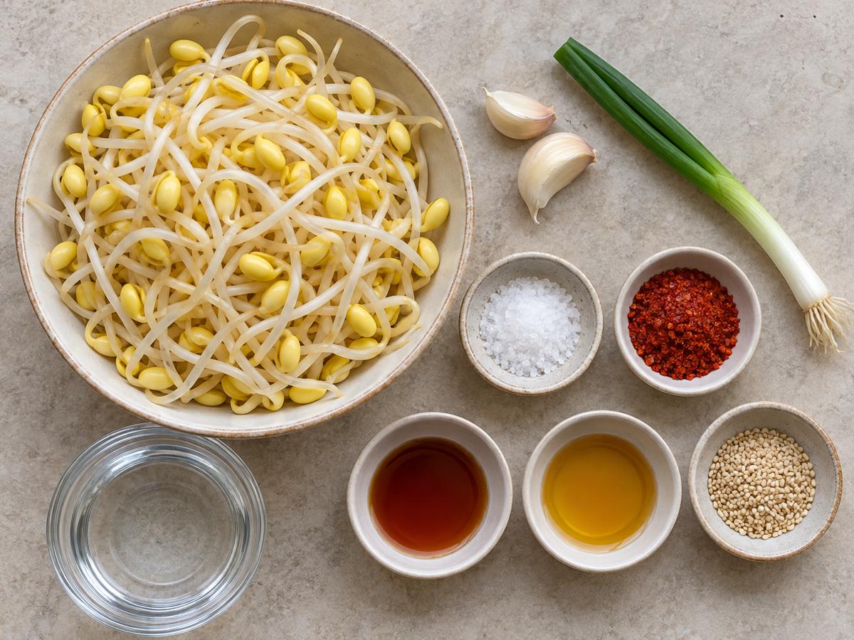 큰 콩머리의 생콩나물과 마늘, 파, 고춧가루, 액젓, 참기름, 깨를 나누어 놓은 재료